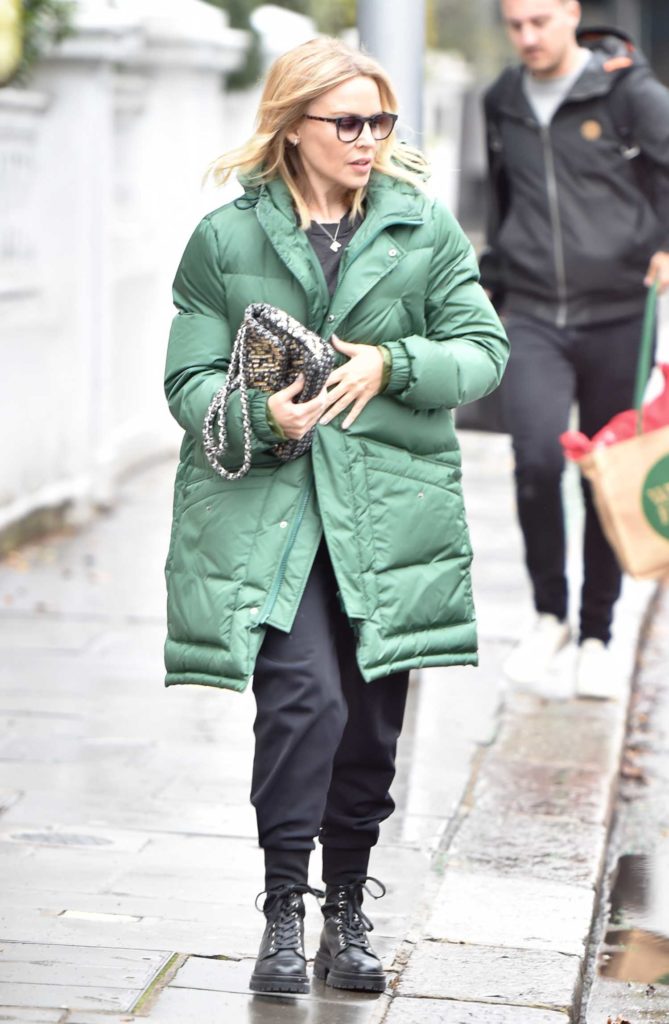 Kylie Minogue in a Green Puffer Coat