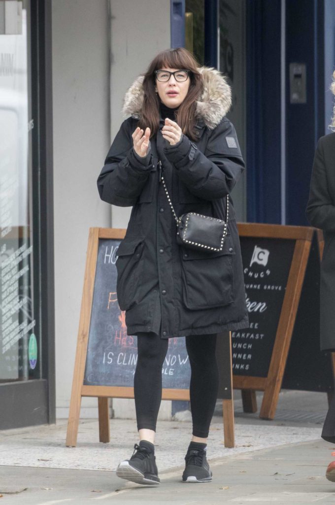 Liv Tyler in a Black Puffer Coat