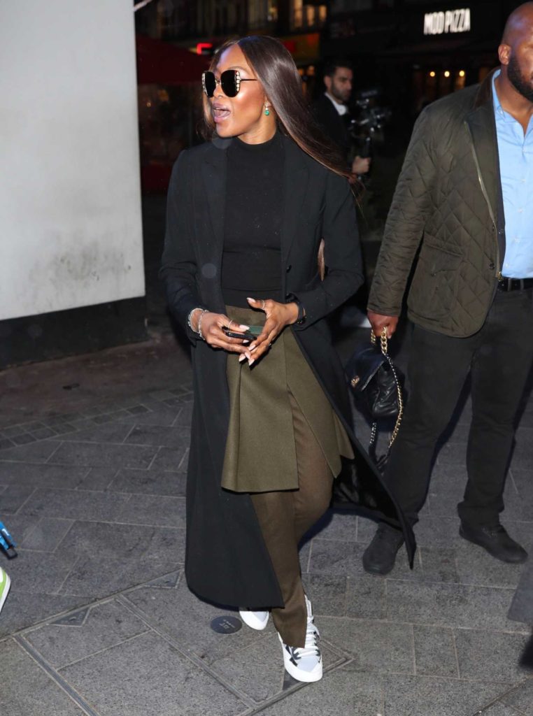 Naomi Campbell in a Black Coat