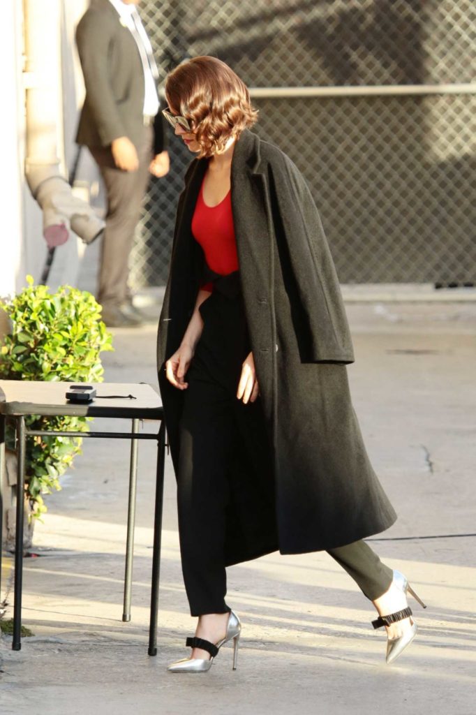 Daisy Ridley in a Black Coat