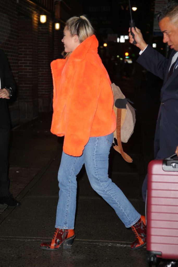 Florence Pugh in an Orange Fur Coat