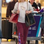 Iggy Azalea in a Purple Sweatpants Arrives at JFK Airport in NYC