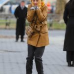 Kaley Cuoco in a Beige Leather Trench Coat on the Set of The Flight Attendant in NYC