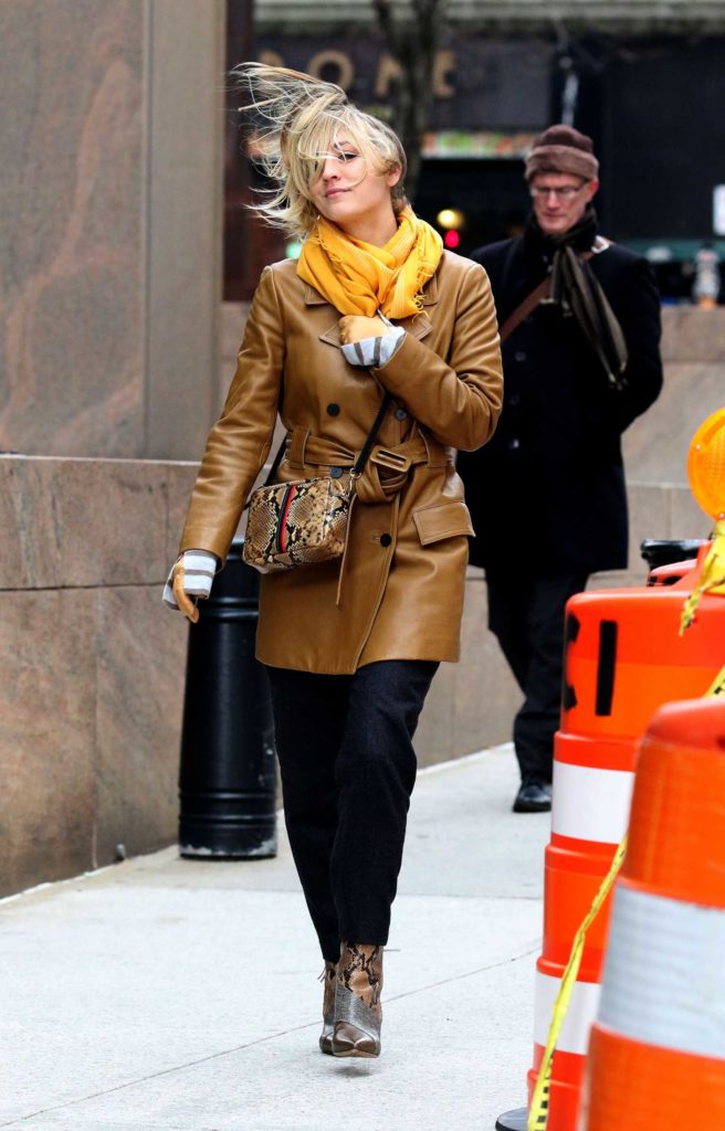 Kaley Cuoco in a Beige Leather Trench Coat