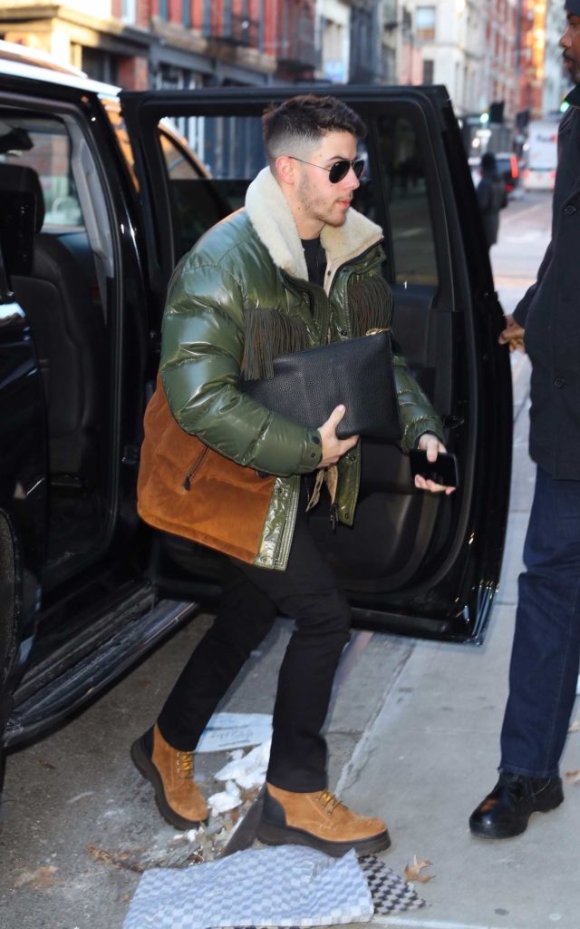 Nick Jonas in a Beige Boots