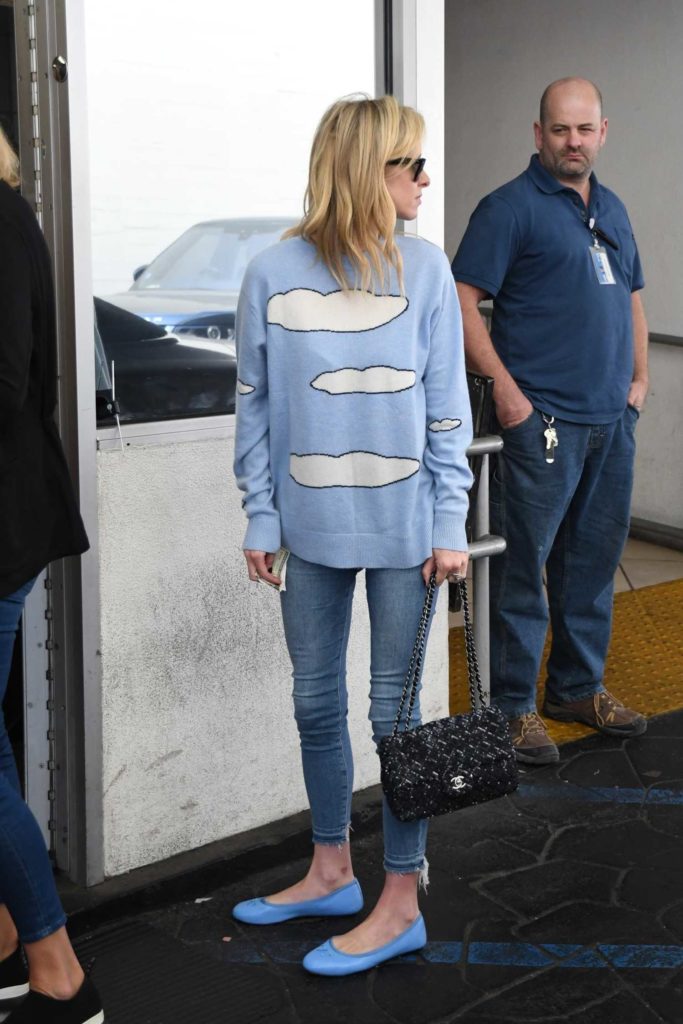 Nicky Hilton in a Blue Sweatshirt