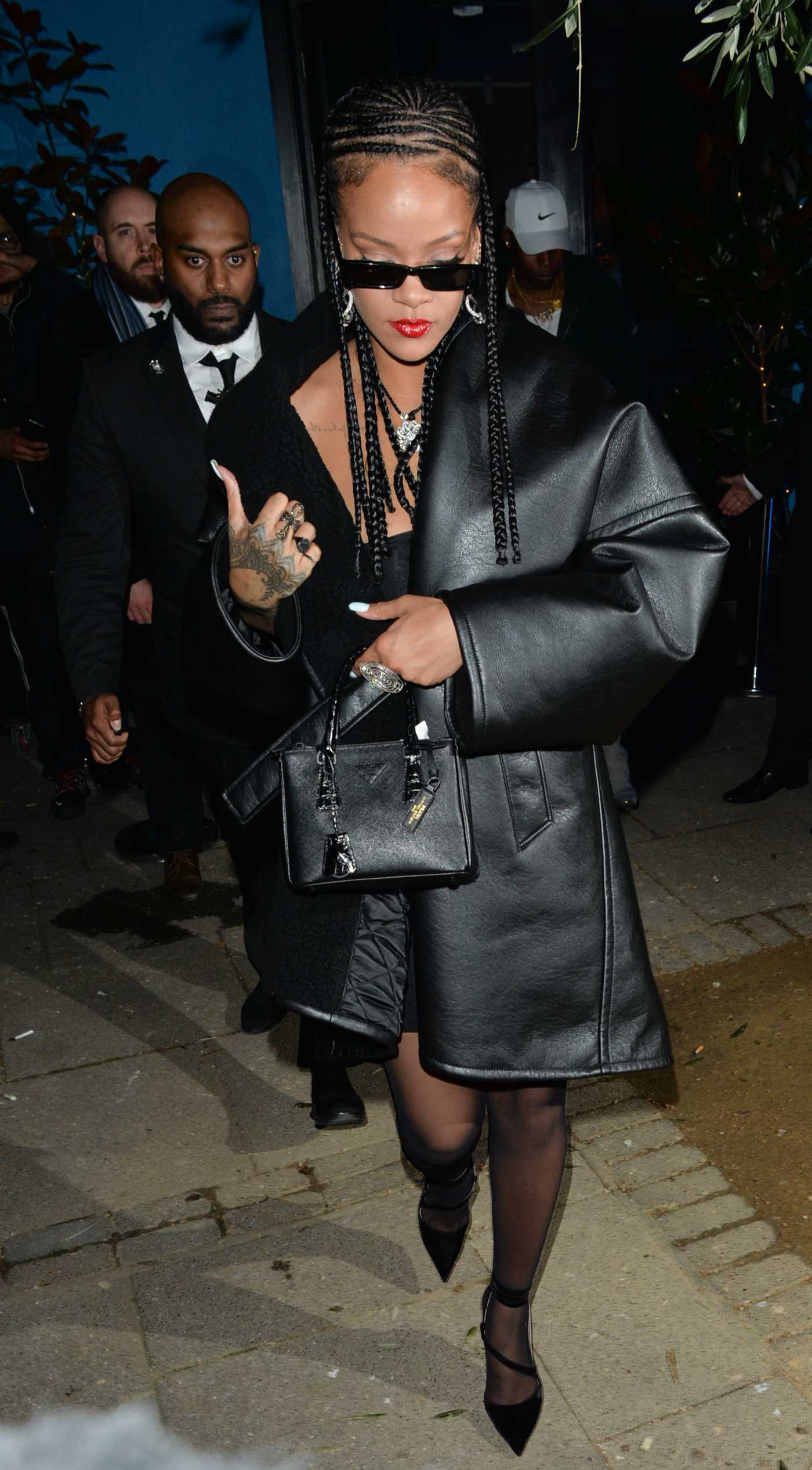 Rihanna in a Black Coat Arrives at 2019 Fashion Awards Afterparty at ...