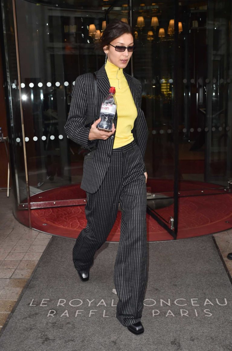 Bella Hadid in a Black Striped Suit Leaves the Royal Monceau Hotel in