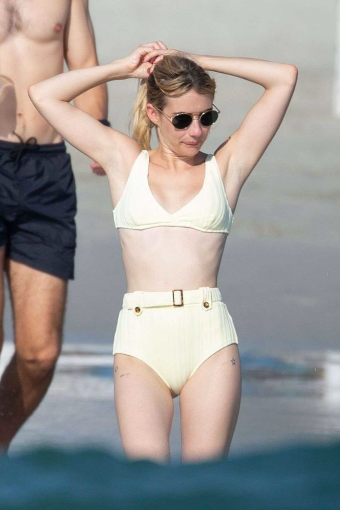 Emma Roberts in a Yellow Bikini