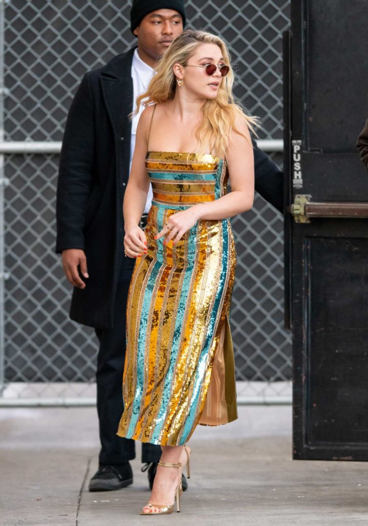 Florence Pugh in a Striped Gold Dress