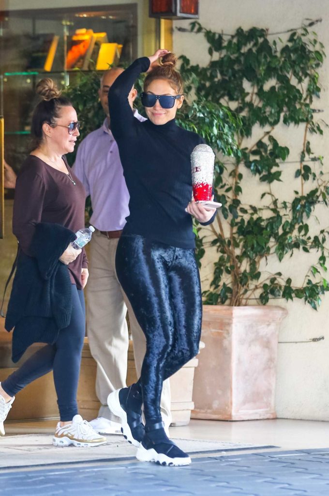 Jennifer Lopez in a Blue Satin Gym Pants