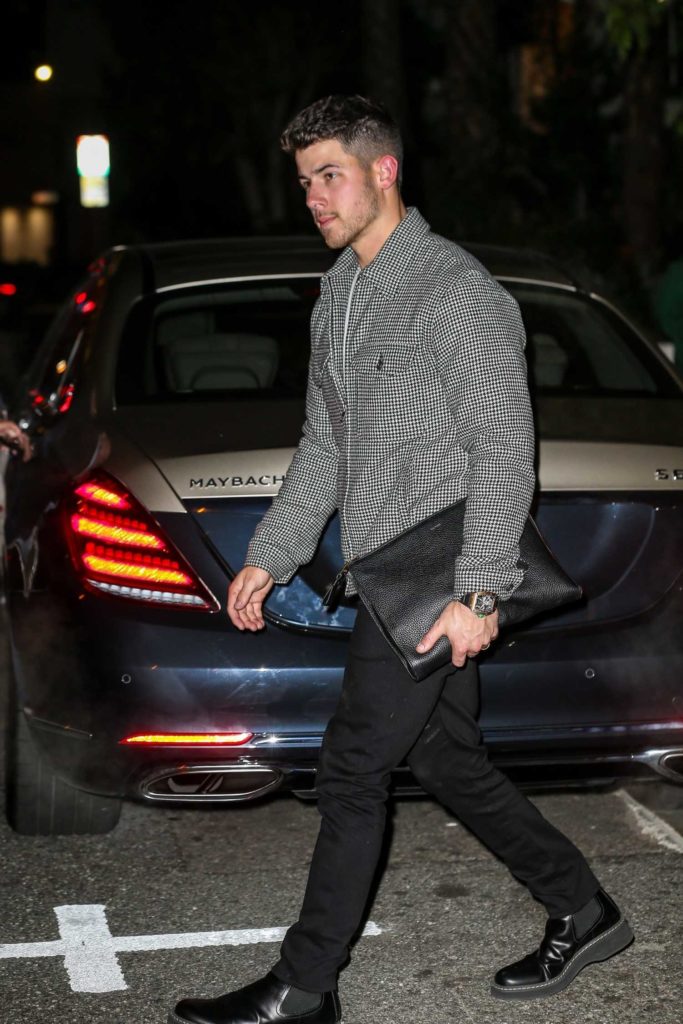 Nick Jonas in a Gray Jacket