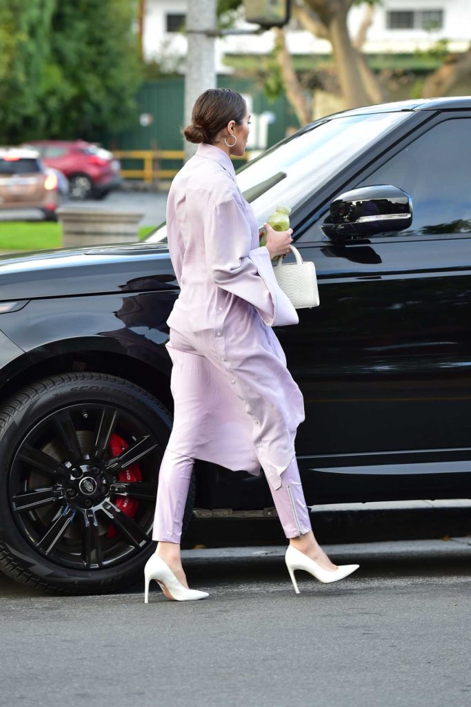 Olivia Culpo in a Purple Suit