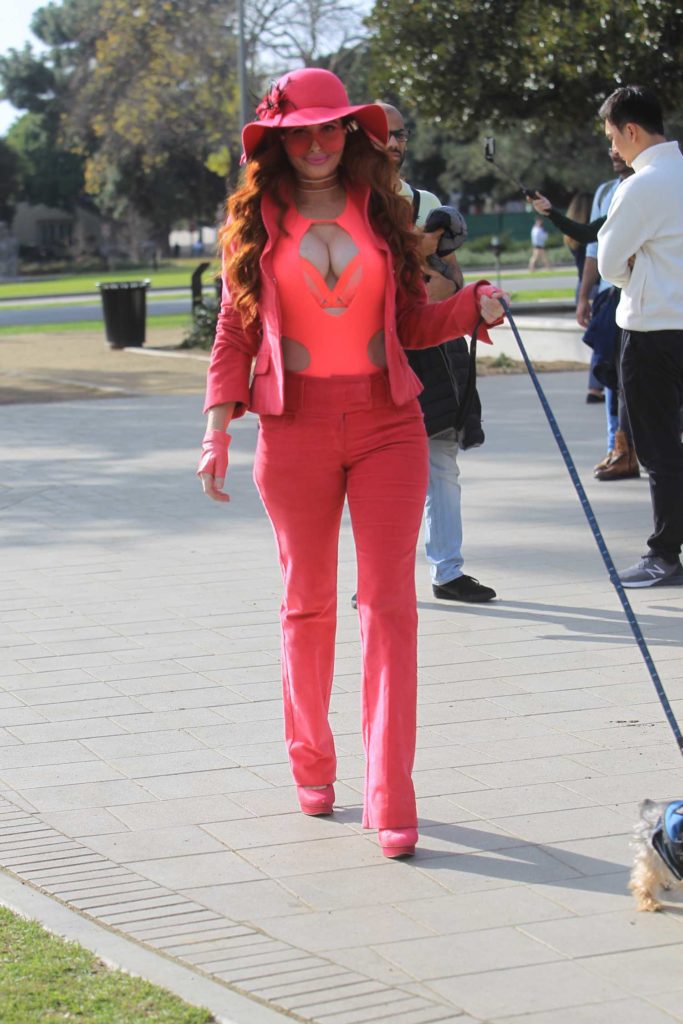 Phoebe Price in a Pink Suit