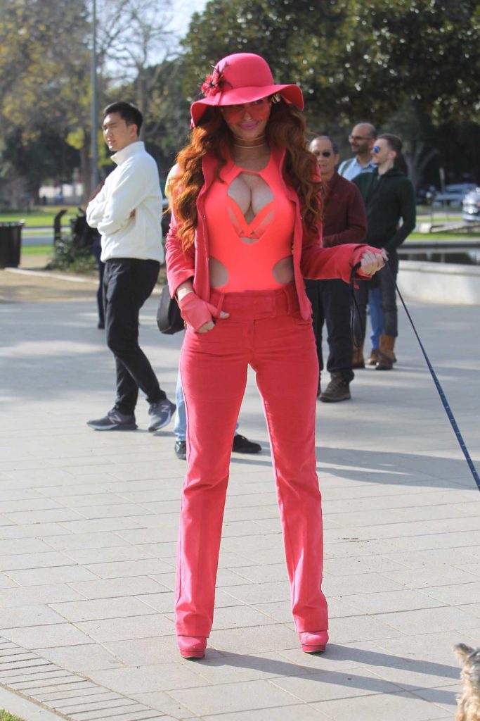 Phoebe Price in a Pink Suit