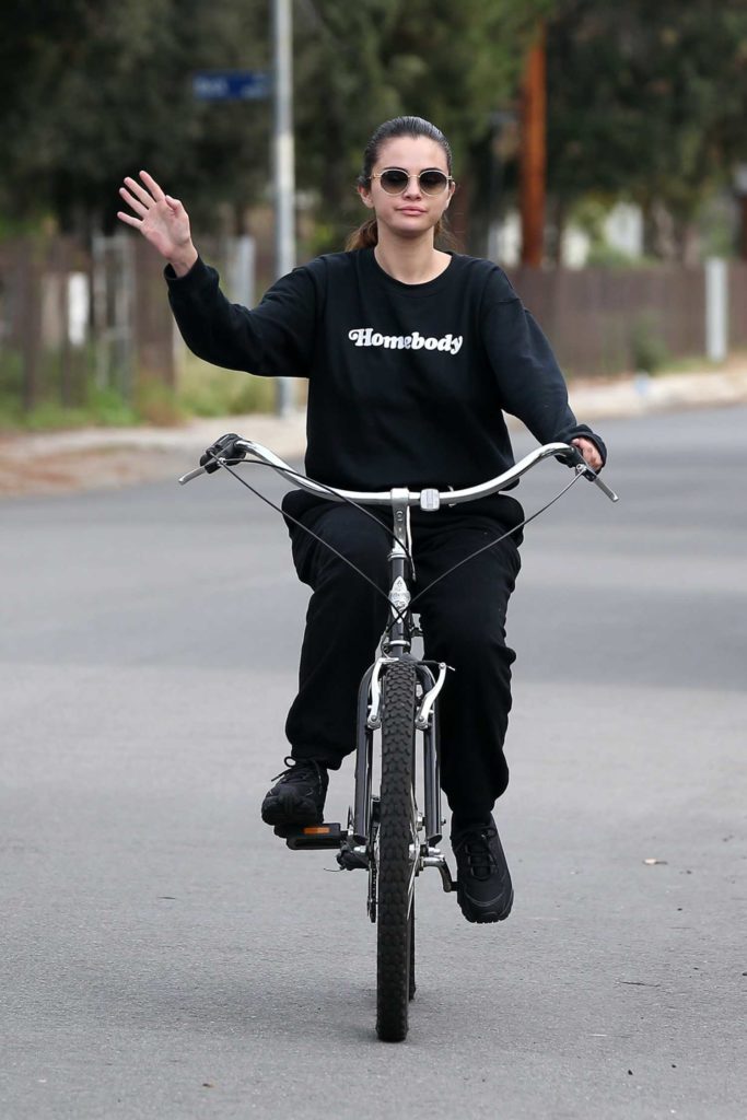 Selena Gomez in a Black Sweatsuit