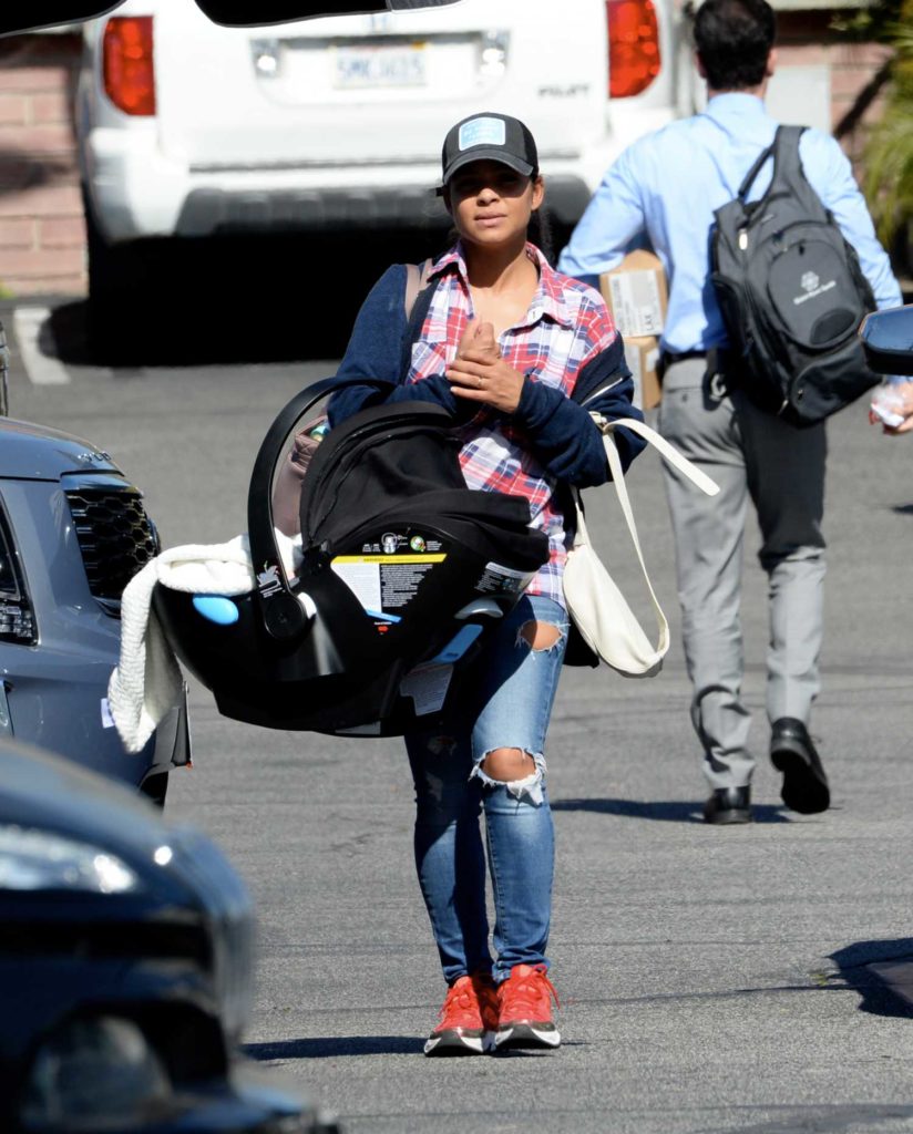 Christina Milian in a Red Sneakers