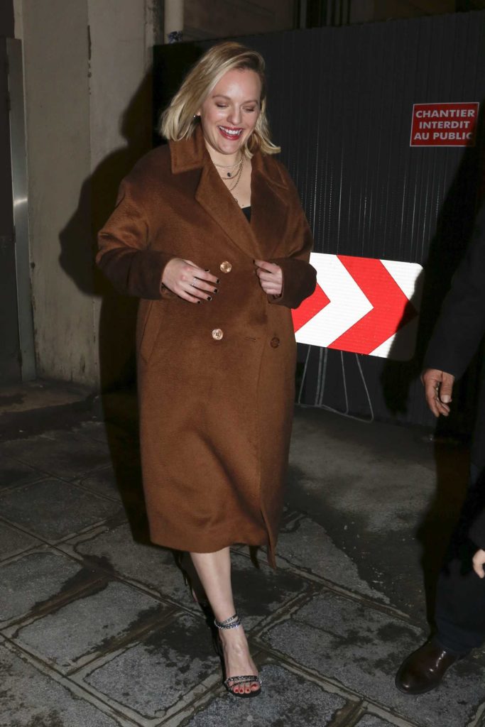 Elisabeth Moss in a Beige Coat