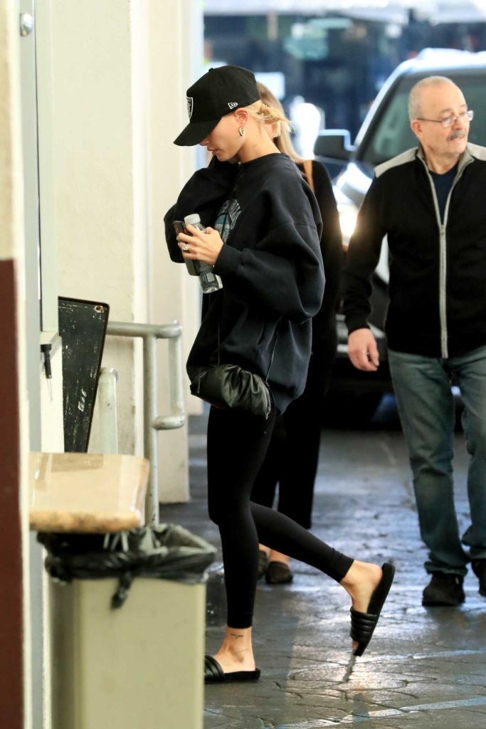 Hailey Bieber in a Black Cap