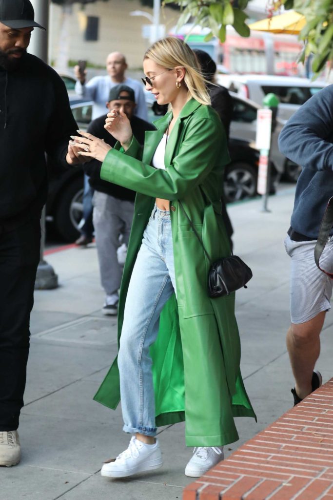 Hailey Bieber in a Green Trench Coat