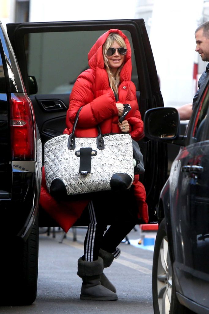 Heidi Klum in a Red Puffer Coat