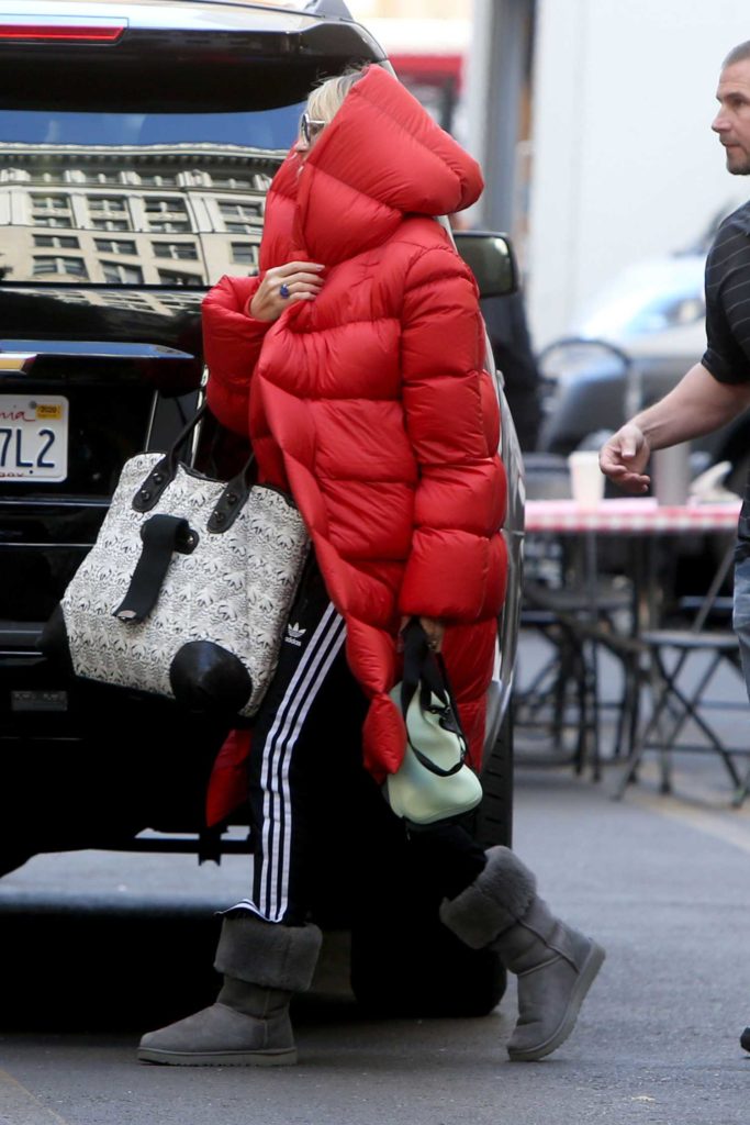 Heidi Klum in a Red Puffer Coat