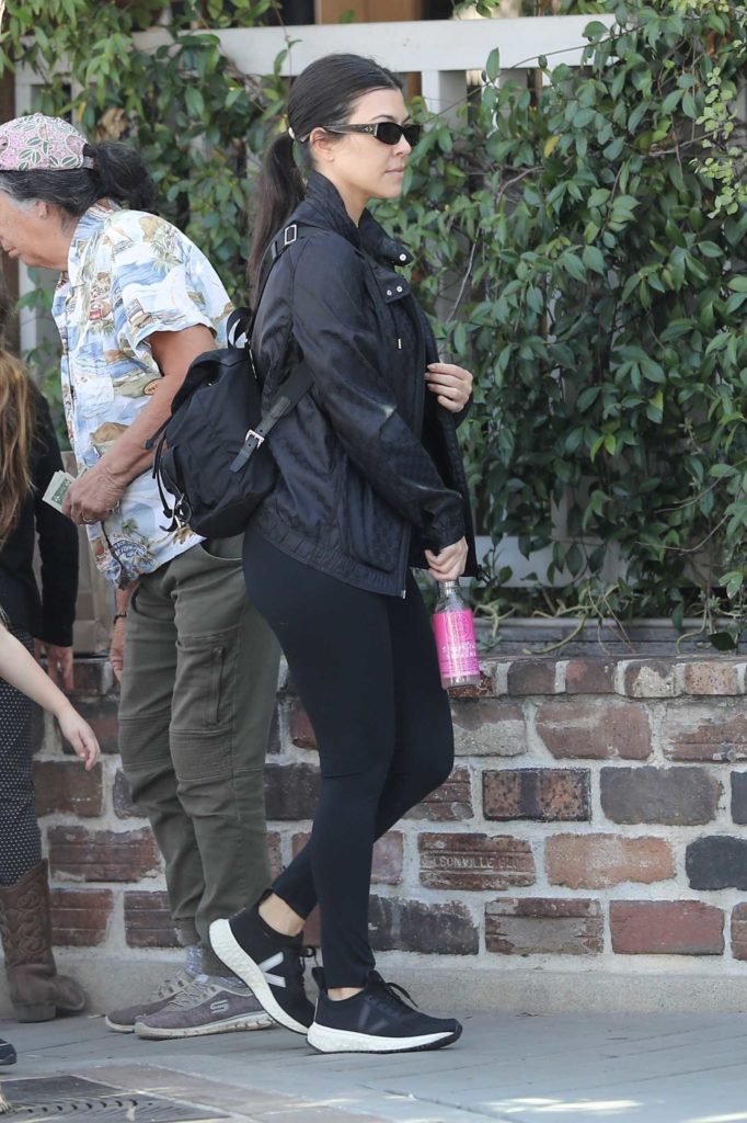 Kourtney Kardashian in a Black Sneakers