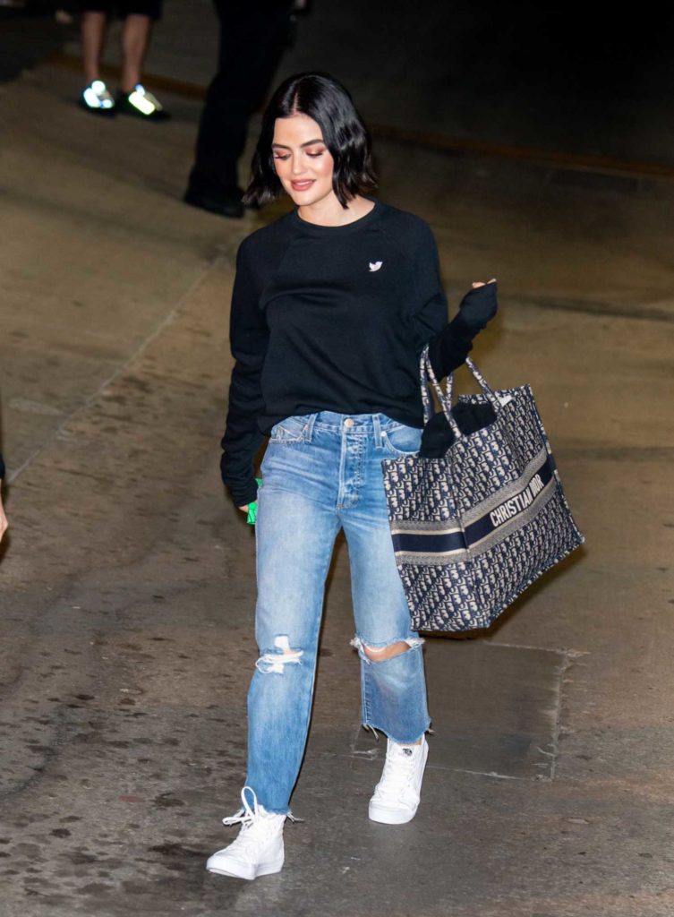 Lucy Hale in a Blue Ripped Jeans