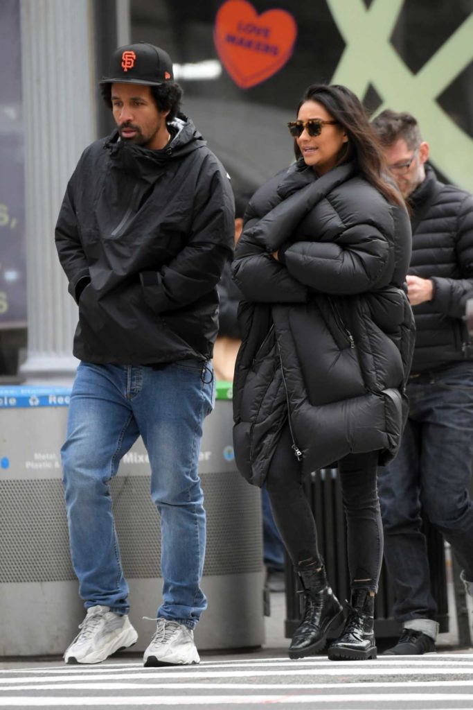 Shay Mitchell in a Black Puffer Coat