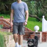 Chace Crawford in a Beige Cap Walks Her Dog Out in Los Feliz