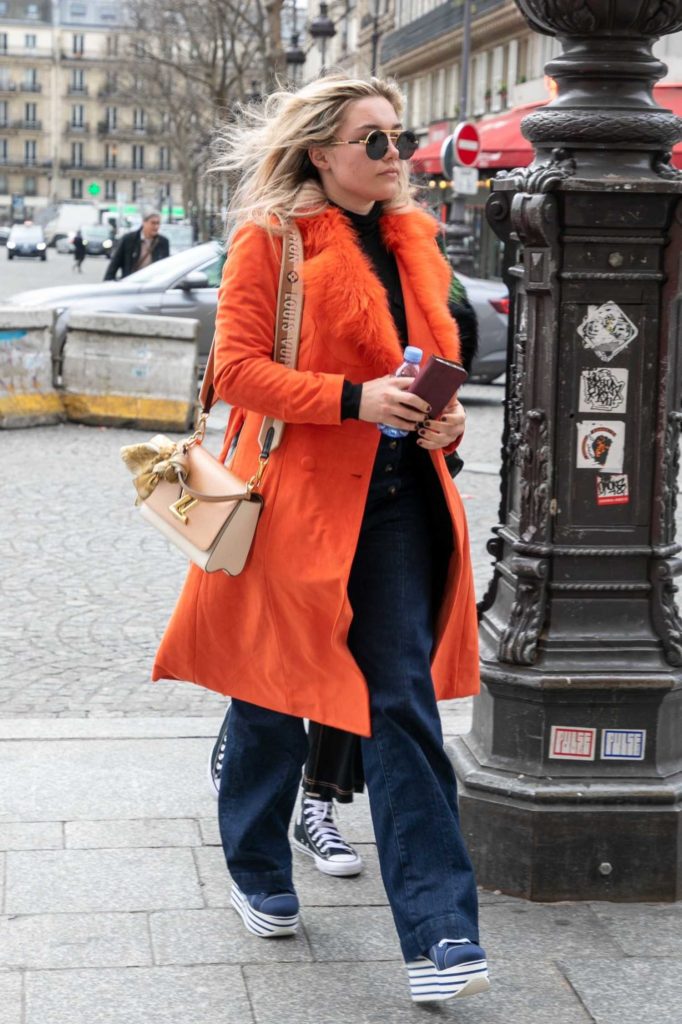 Florence Pugh in an Orange Coat