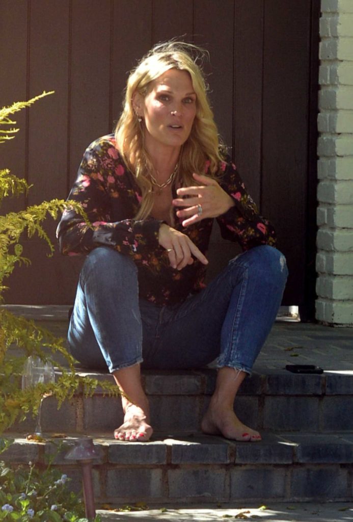 Molly Sims in a Black Floral Blouse