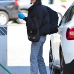 Rebecca Black in a Bright Blue Latex Gloves Pumps Gas in Los Angeles