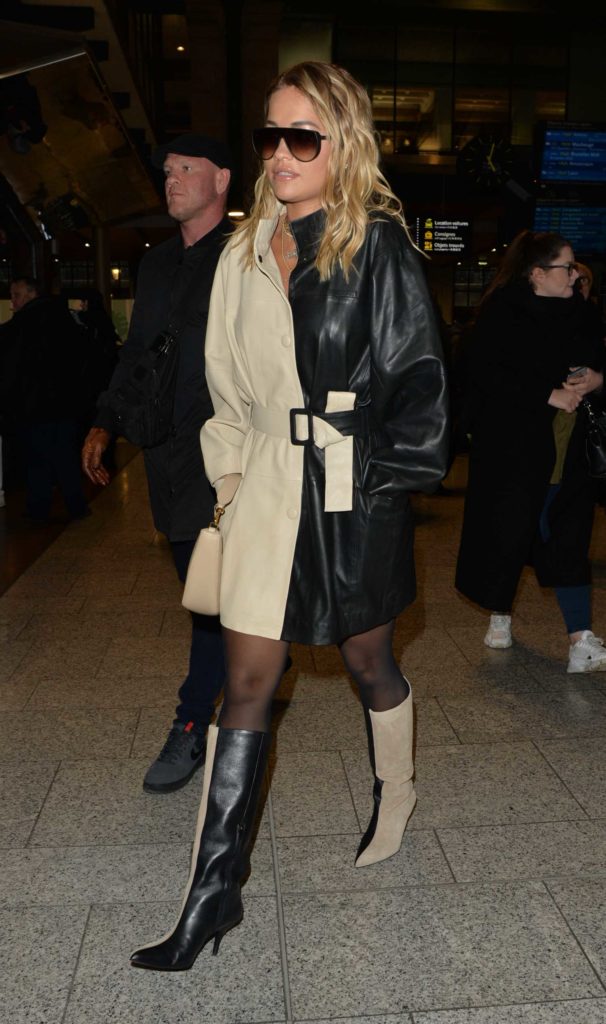 Rita Ora in a Black and Beige Coat