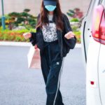 Angelababy in a Face Mask Arrives at Airport in Shanghai