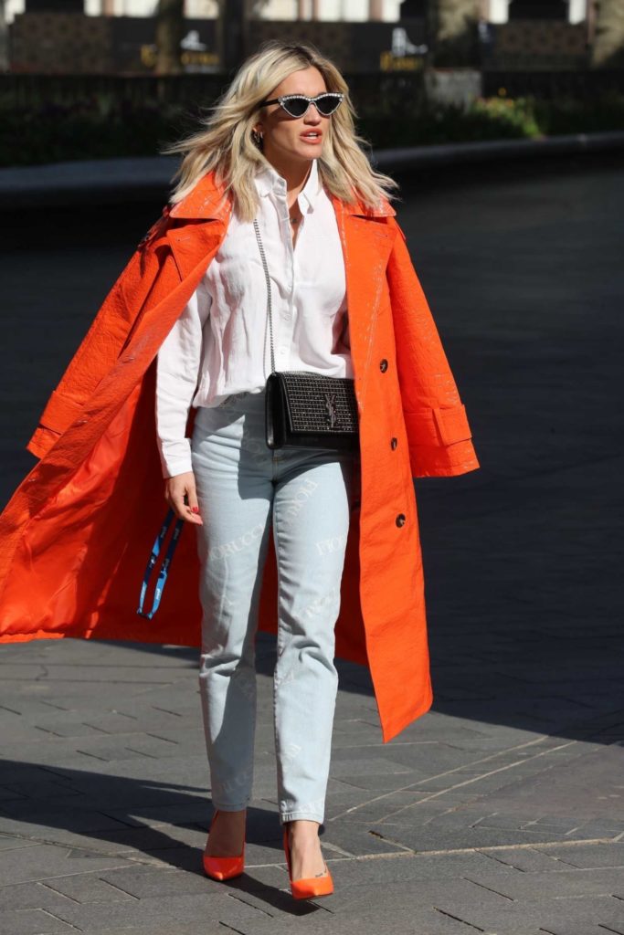 Ashley Roberts in an Orange Leather Trench Coat