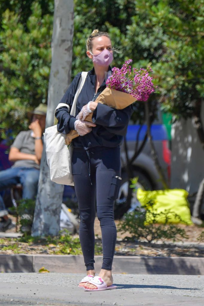 Brie Larson in a Purple Face Mask