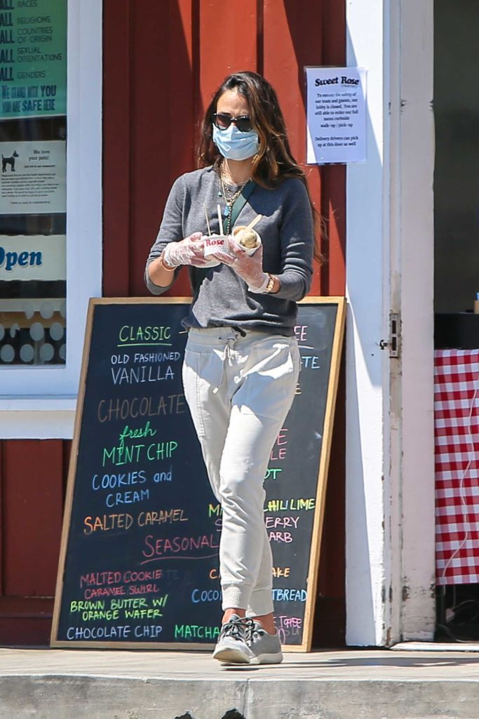 Jordana Brewster in a Blue Face Mask