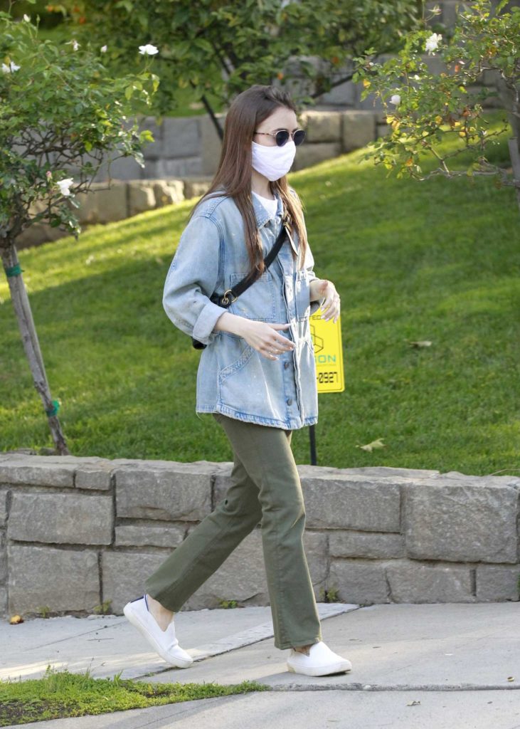 Lily Collins in a Face Mask