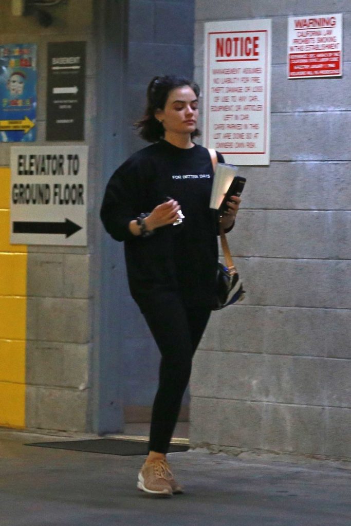 Lucy Hale in a Tan Sneakers