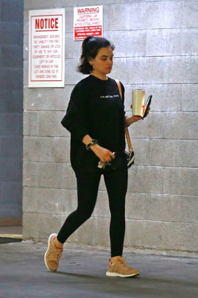 Lucy Hale in a Tan Sneakers