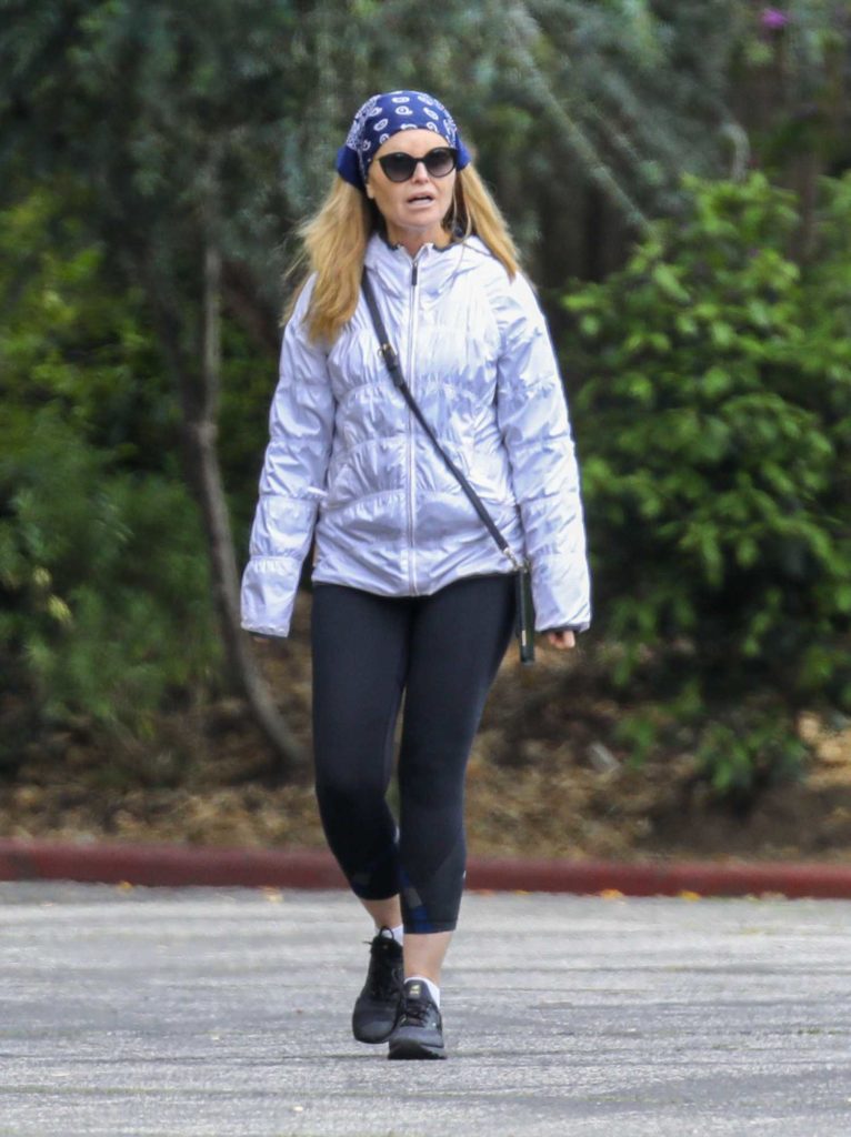 Maria Shriver in a Black Sneakers