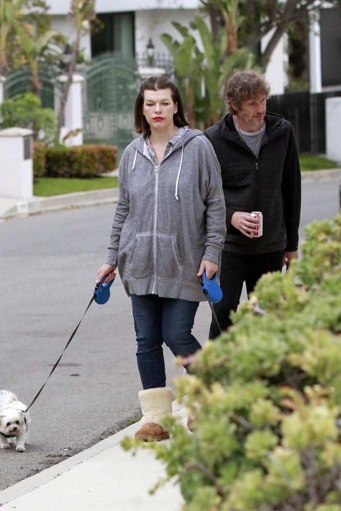 Milla Jovovich in a Gray Hoody