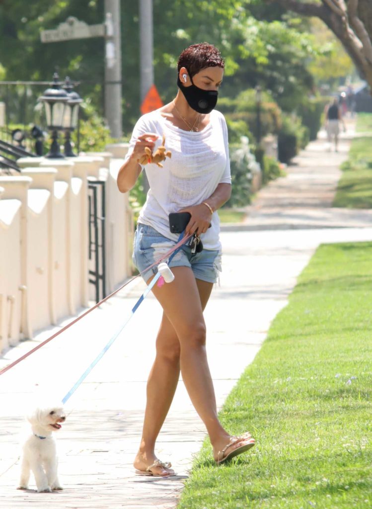 Nicole Murphy in a Ripped Shorts