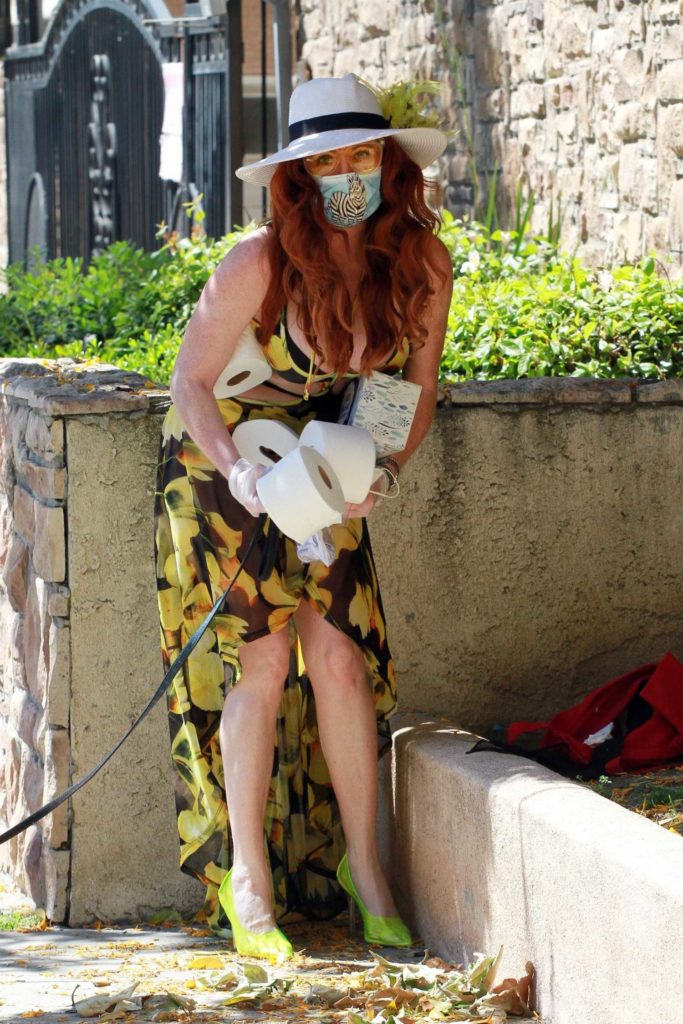 Phoebe Price in a Floral Print Dress