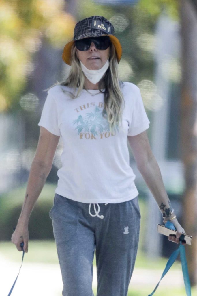Tish Cyrus in a White Tee