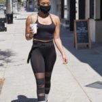 Ariane Andrew in a Black Top Stops by Starbucks with Her Boyfriend in Studio City