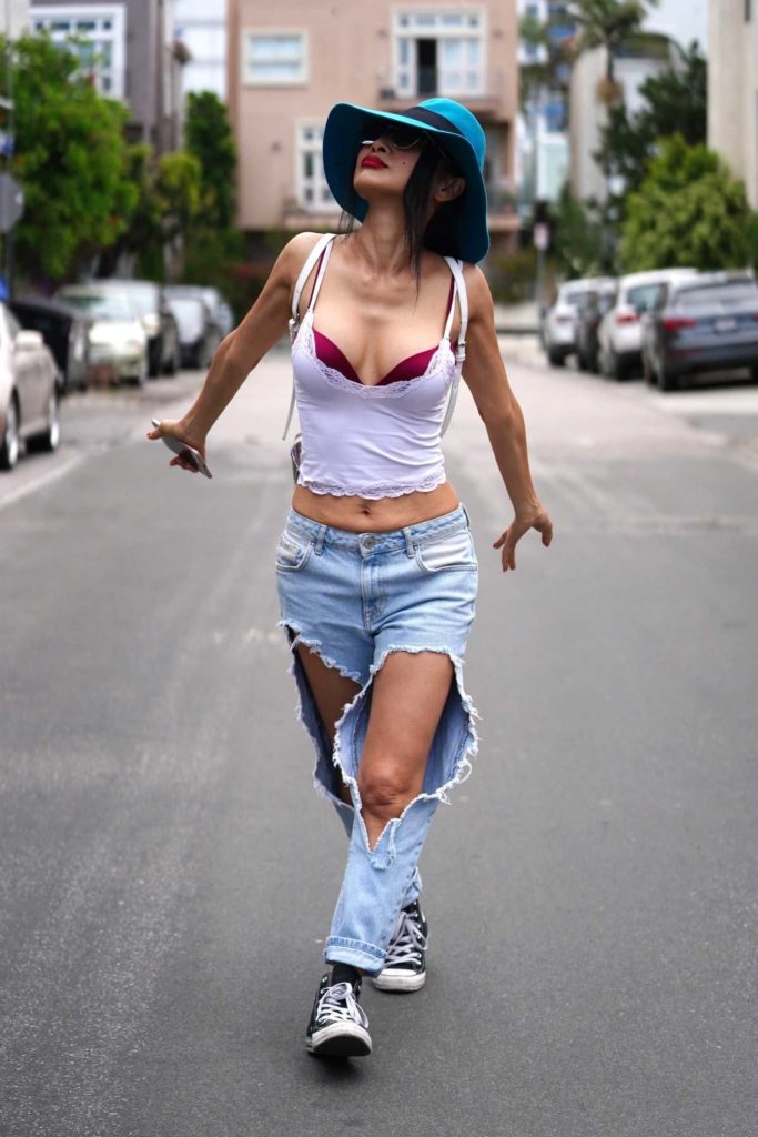 Bai Ling in a Blue Ripped Jeans