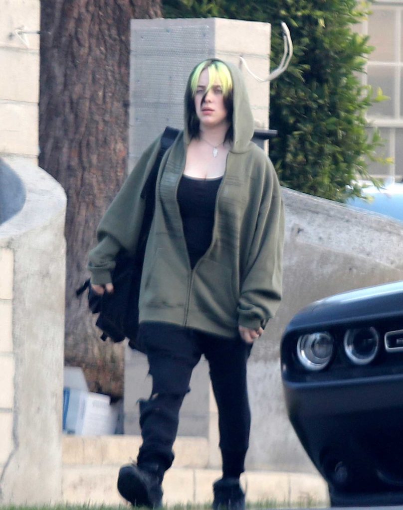 Billie Eilish in a Black Ripped Jeans