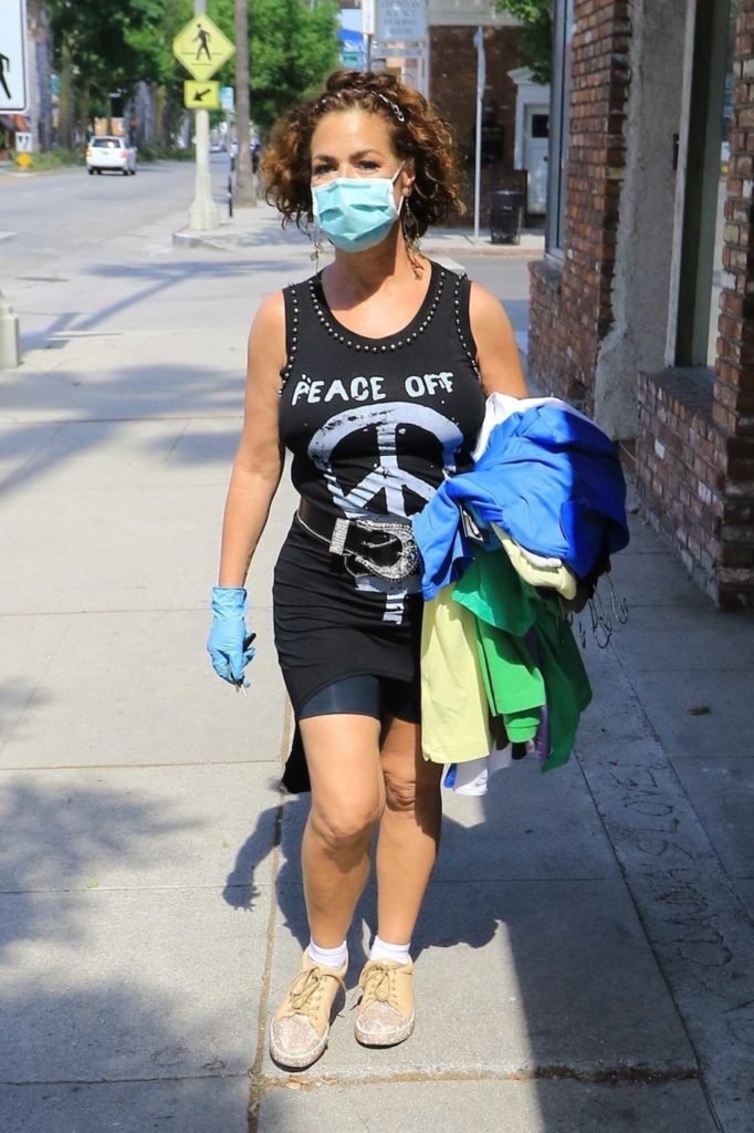 Claudia Wells in a Protective Mask